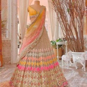 The multi color lehenga is a unique piece fits for L-XL